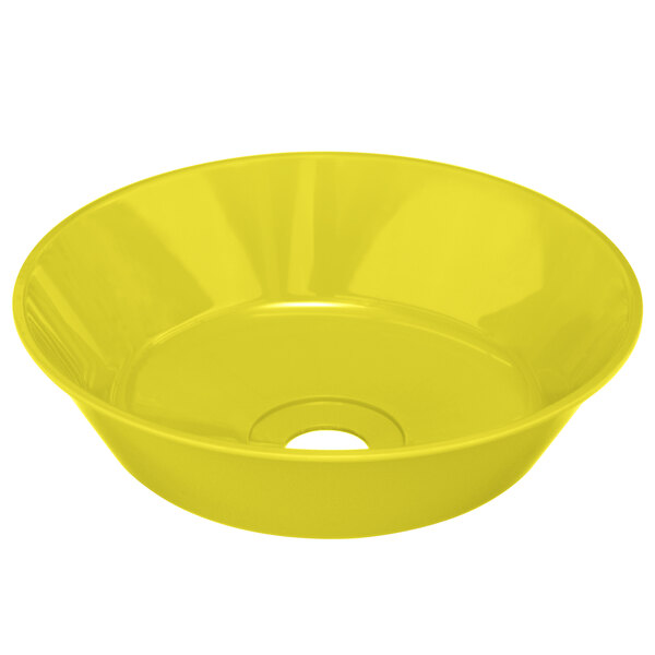 A close up of a yellow Guardian Equipment eye/face wash bowl with a hole in the middle.