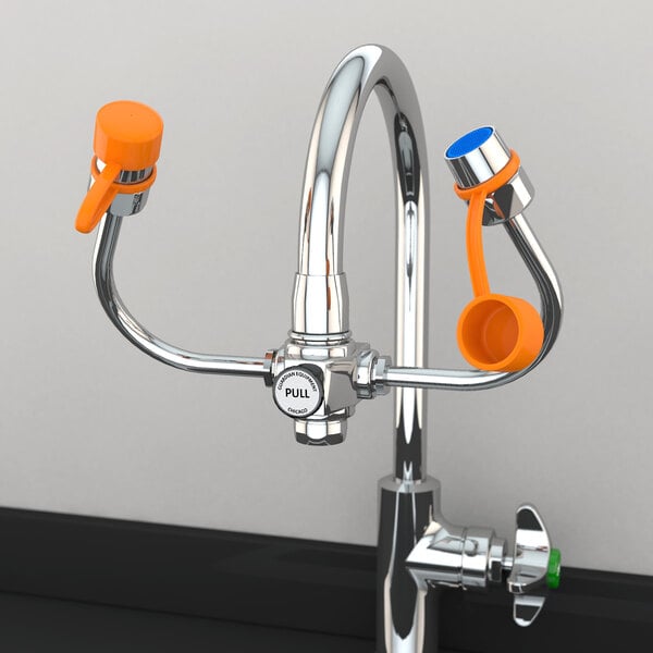 A Guardian Equipment EyeSafe-X faucet with orange handles.