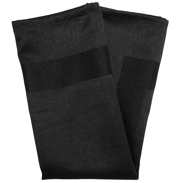A black folded Snap Drape Milan satin cloth napkin.