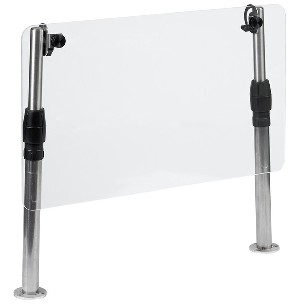 A Vollrath clear plastic safety partition with metal legs on a counter.