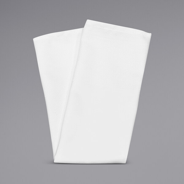 A folded white Milan Birdseye banded cloth napkin.