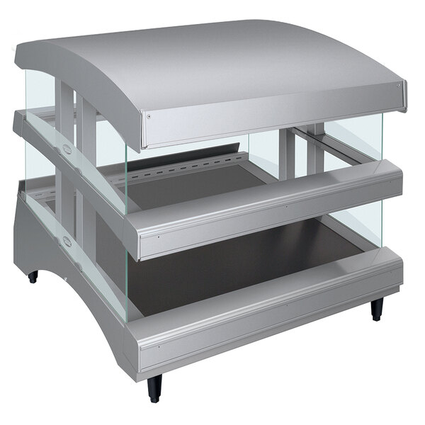 A silver Hatco countertop display warmer with glass shelves.