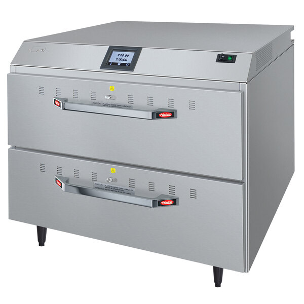 A silver and gray Hatco freestanding drawer warmer with touchscreen controls.