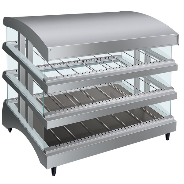 A Hatco countertop heated glass display with three slanted shelves inside.