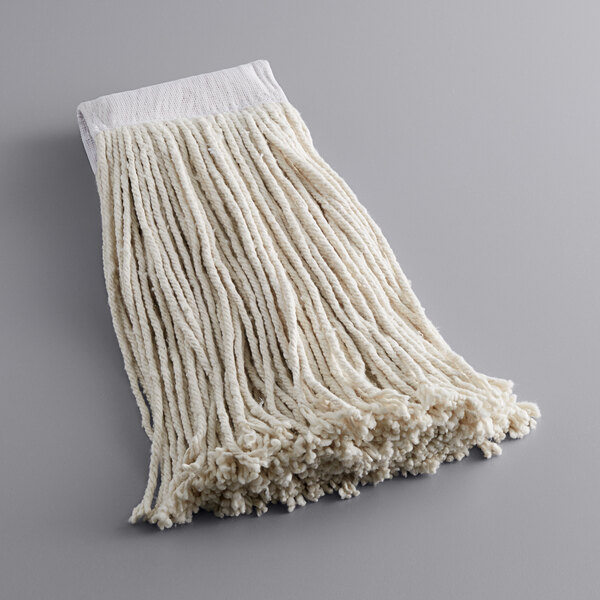 A white Choice natural cotton wet mop head on a gray surface.