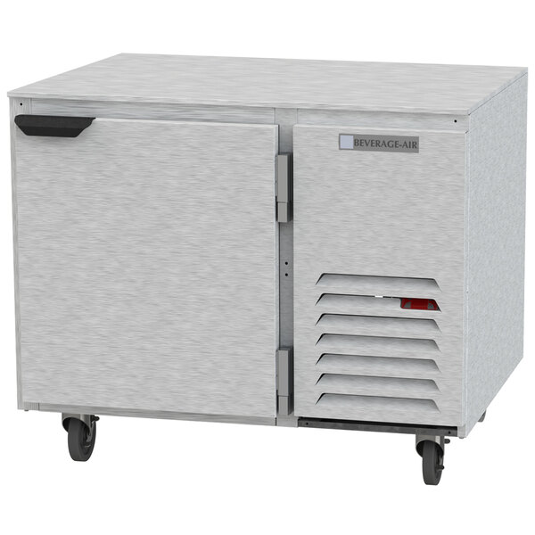 A white Beverage-Air undercounter refrigerator with two doors and a drawer on wheels.