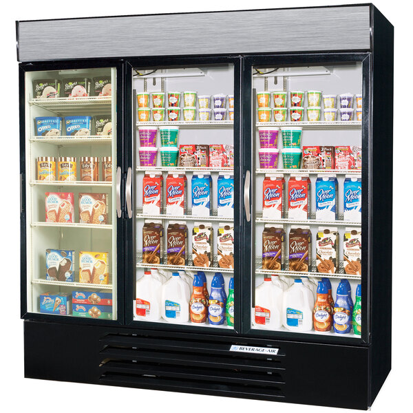 A Beverage-Air MarketMax black three-section dual temperature merchandiser with drinks and yogurt inside.