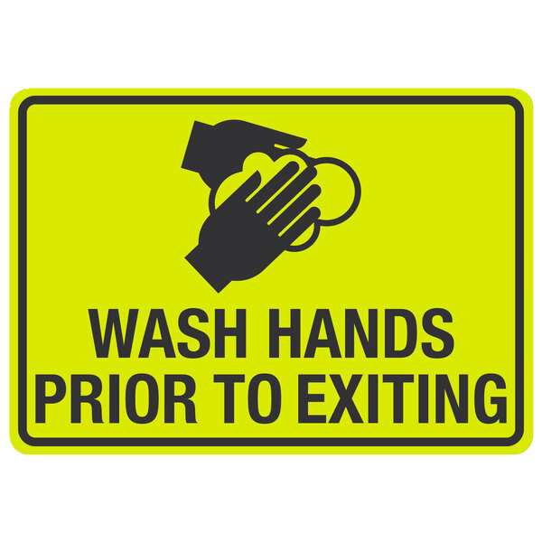 A yellow sign with black text and a hand washing symbol that says "Wash Hands Prior To Exiting"