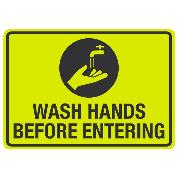 A yellow and black sign with the words "Wash Hands Before Entering" and a black and white symbol of a hand washing a faucet.