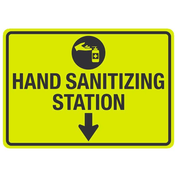 A yellow sign with black text and a black arrow that says "Hand Sanitizing Station" with a hand and liquid bottle symbol.