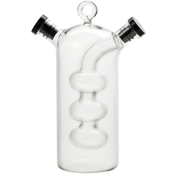 An American Metalcraft glass oil and vinegar cruet with a spiral shaped tube.