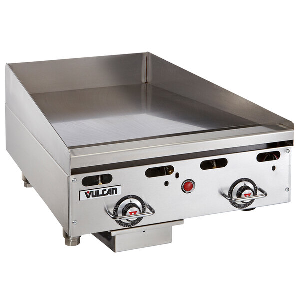 A Vulcan MSA24-30C stainless steel gas griddle on a counter with knobs.