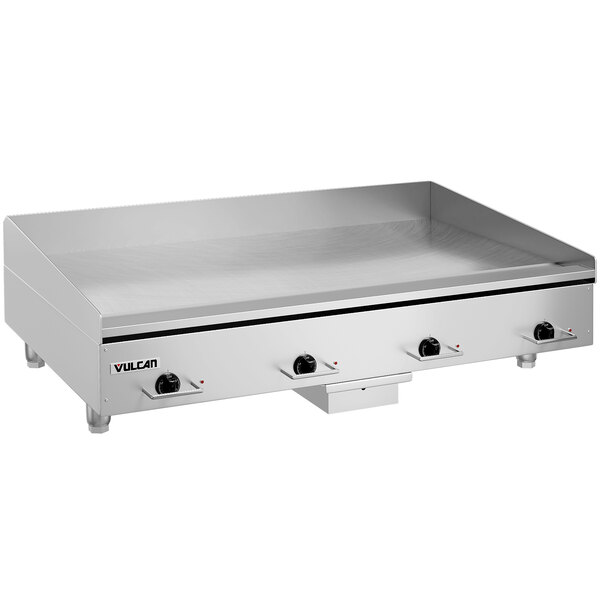 A large stainless steel Vulcan countertop electric griddle with chrome top and knobs.
