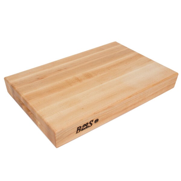 A John Boos maple wood cutting board with the word "John Boos" on it.