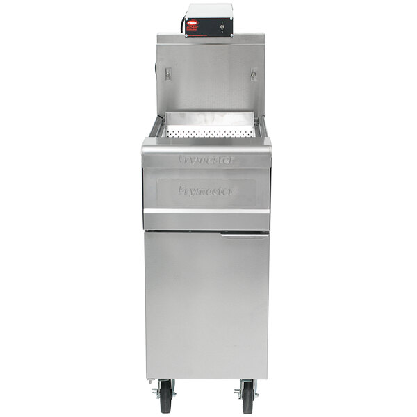A stainless steel Frymaster spreader cabinet with a curved scoop pan on wheels.