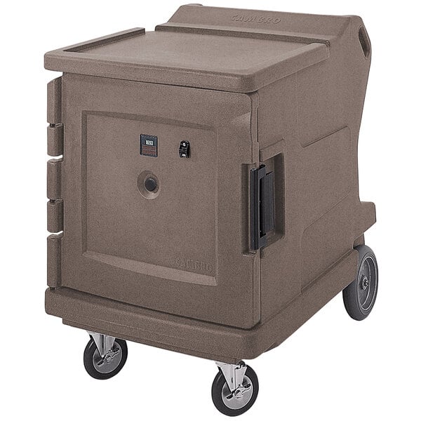 A large brown Cambro hot food holding cabinet on wheels.