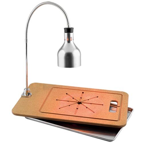 A Cres Cor portable carving station set up on a table with a lamp above it.