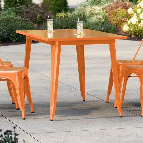 Lancaster Table & Seating Alloy Series 48" x 30" Amber Orange Standard Height Outdoor Table