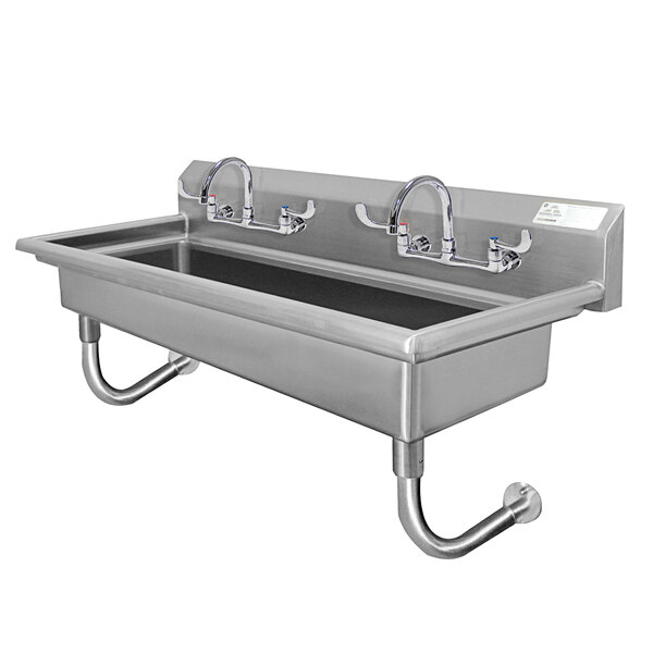 A stainless steel Advance Tabco wall mounted hand sink with 2 faucets.