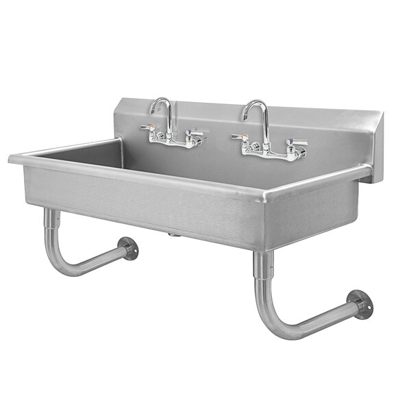 A stainless steel Advance Tabco wall mounted utility sink with two faucets.