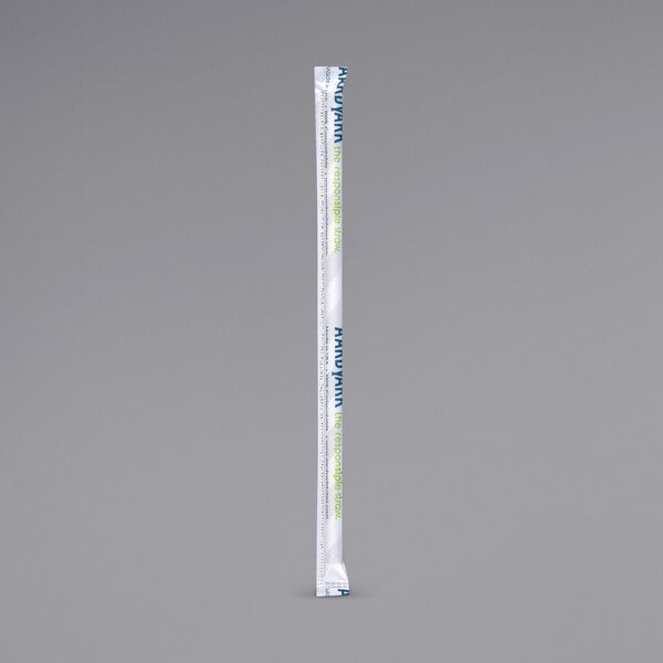 A white stick with green and blue text.