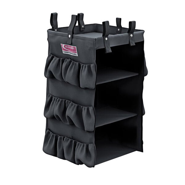 A black fabric organizer with three ruffled pockets and black straps.