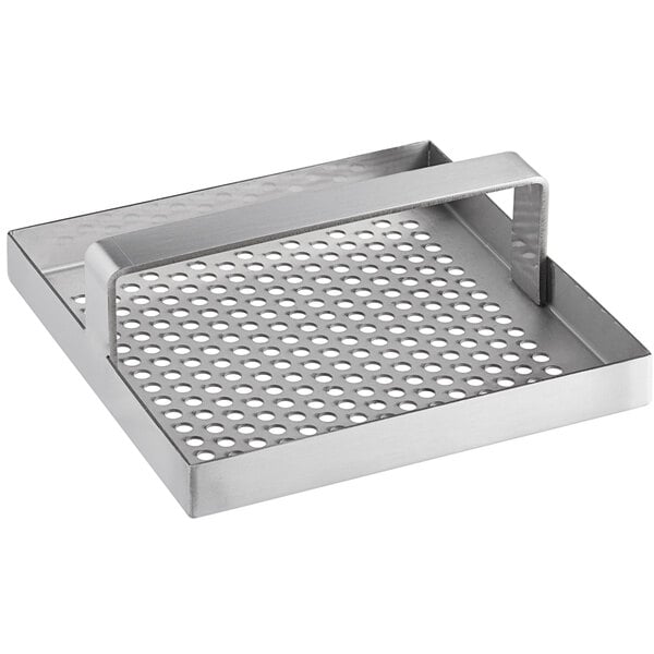 A metal square floor drain strainer with a handle and a metal grid with holes.
