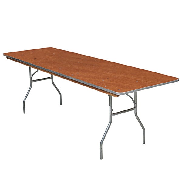 A Resilient rectangular wooden folding seminar table with metal legs.