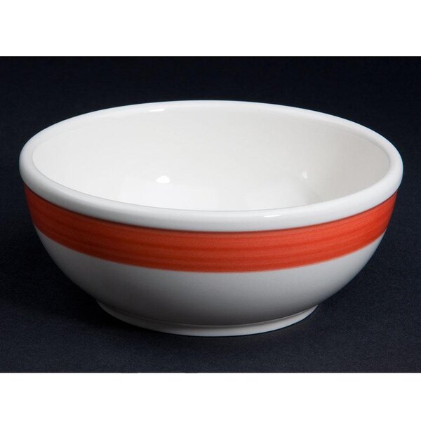A white stoneware bowl with a red stripe on the edge.