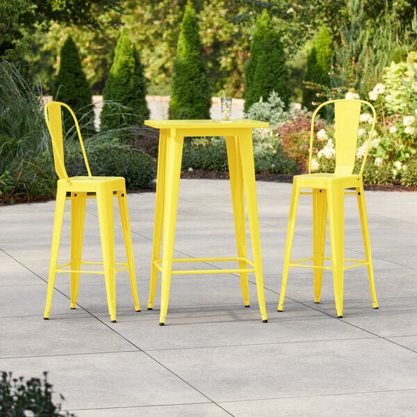 Lancaster Table & Seating Alloy Series 23 1/2" x 23 1/2" Citrine Yellow Bar Height Outdoor Table with 2 Cafe Barstools