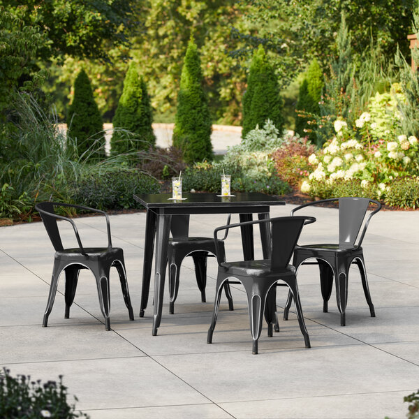 Lancaster Table & Seating Alloy Series 31 1/2" x 31 1/2" Distressed Onyx Black Standard Height Outdoor Table with 4 Arm Chairs