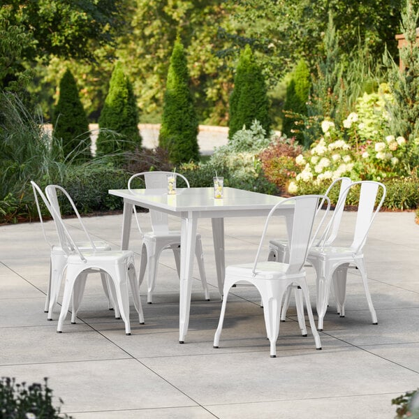 Lancaster Table & Seating Alloy Series 63" x 31 1/2" Pearl White Standard Height Outdoor Table with 6 Cafe Chairs