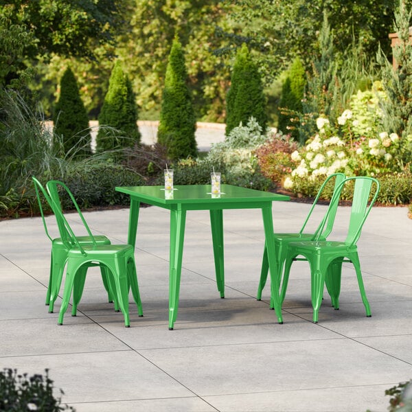 Lancaster Table & Seating Alloy Series 47 1/2" x 29 1/2" Green Standard Height Outdoor Table with 4 Cafe Chairs