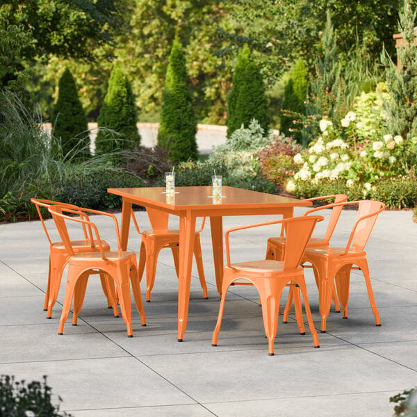 Lancaster Table & Seating Alloy Series 63" x 31 1/2" Orange Standard Height Outdoor Table with 6 Arm Chairs