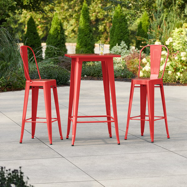Lancaster Table & Seating Alloy Series 23 1/2" x 23 1/2" Ruby Red Bar Height Outdoor Table with 2 Cafe Barstools