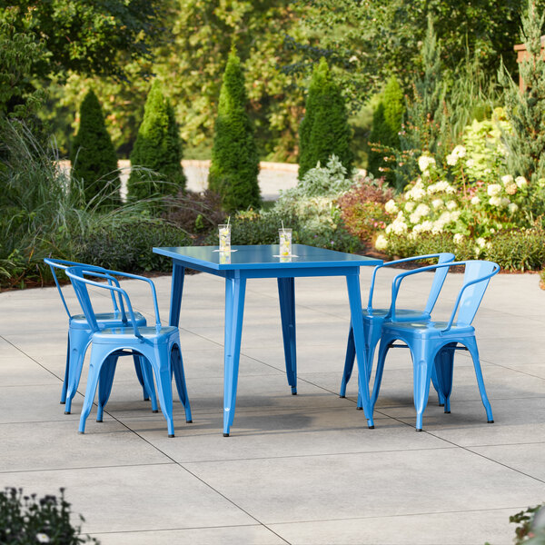 Lancaster Table & Seating Alloy Series 47 1/2" x 29 1/2" Blue Quartz Standard Height Outdoor Table with 4 Arm Chairs