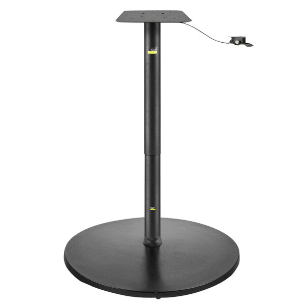 A FLAT Tech black metal table base with a black pole and a red top.