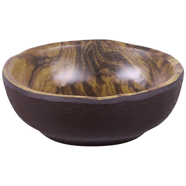 An Elite Global Solutions wood grain melamine bowl.