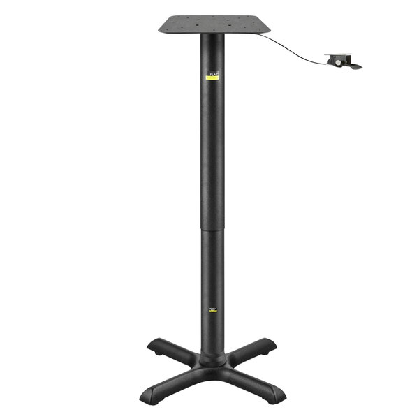 A FLAT Tech black table base with a black pneumatic post.