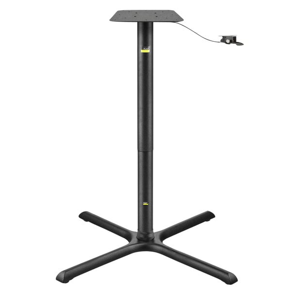 A black FLAT Tech table base with a height adjusting pneumatic post.