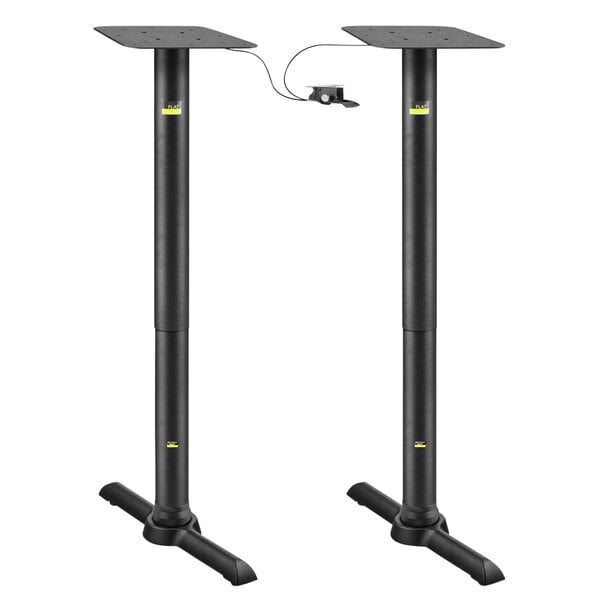 A pair of FLAT Tech black metal end table bases.