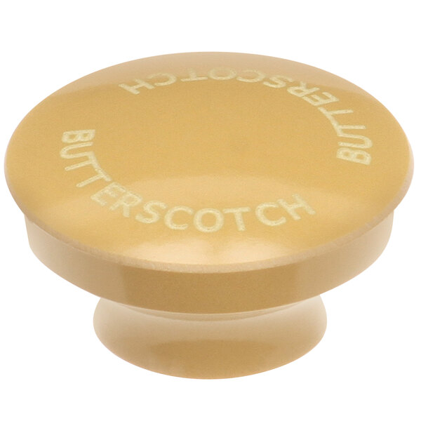 A yellow knob with the word "Butterscotch" on it.