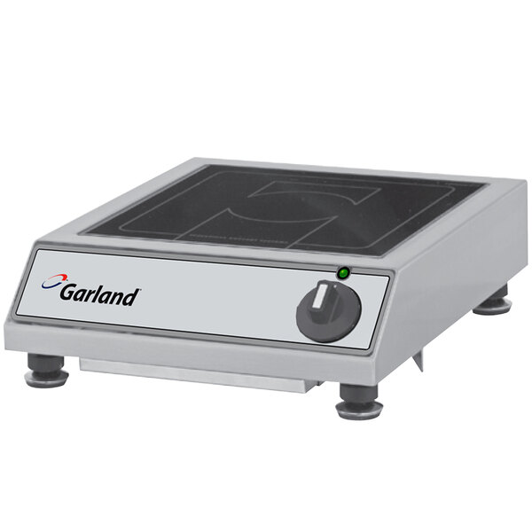 A Garland baby induction cooker on a countertop.
