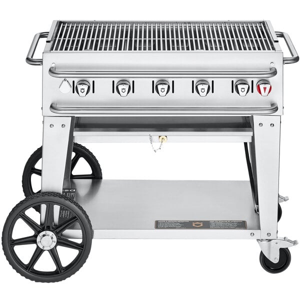 A Crown Verity liquid propane outdoor grill with wheels.
