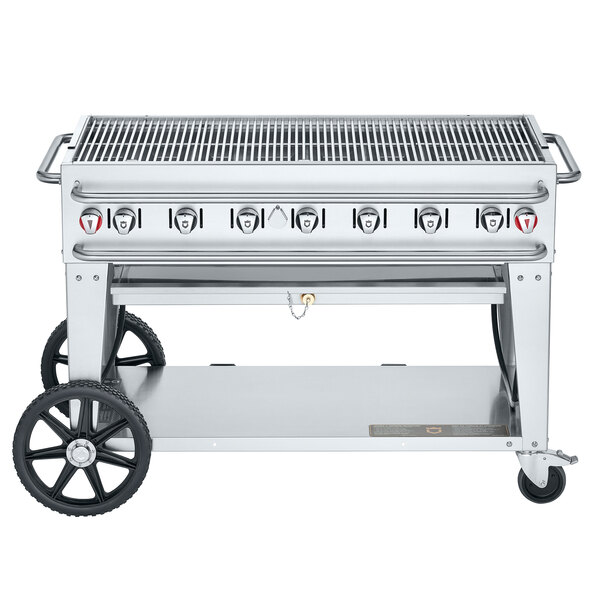 A Crown Verity Pro Series outdoor grill on a cart with wheels.