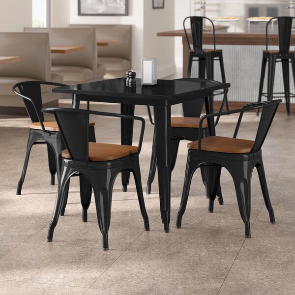 Lancaster Table & Seating Alloy Series 32" x 32" Onyx Black Standard Height Indoor Table and 4 Arm Chairs with Walnut Wood Seats