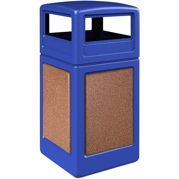 A blue rectangle trash can with brown square panels and a blue dome lid.