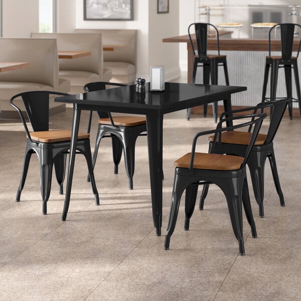 Lancaster Table & Seating Alloy Series 30" x 48" Black Standard Height Indoor Table and 4 Arm Chairs with Walnut Wood Seats