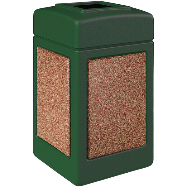 A green and brown rectangular Commercial Zone StoneTec waste receptacle with Sedona panels.