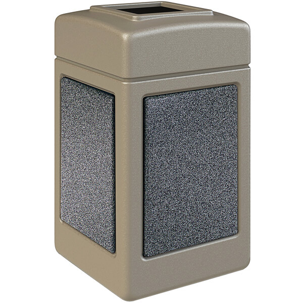 A beige rectangular waste receptacle with black square panels.